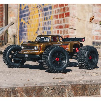 1/10 OUTCAST 4S 4X4 RTR Brushless Stunt Truck, Bronze 1/10 OUTCAST 4S 4X4 RTR Brushless Stunt Truck, Bronze