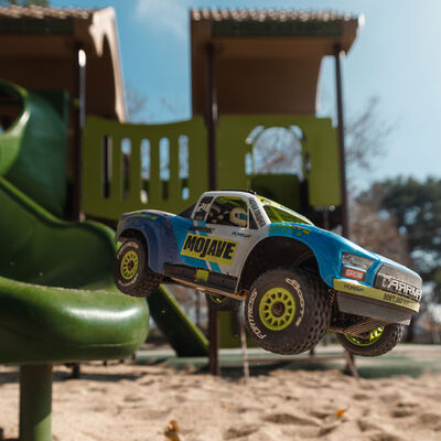 1/16 MOJAVE GROM 4X4 RTR Brushed Desert Truck (Battery & Charger Included), Blue/White 1/16 MOJAVE GROM 4X4 RTR Brushed Desert Truck (Battery & Charger Included), Blue/White